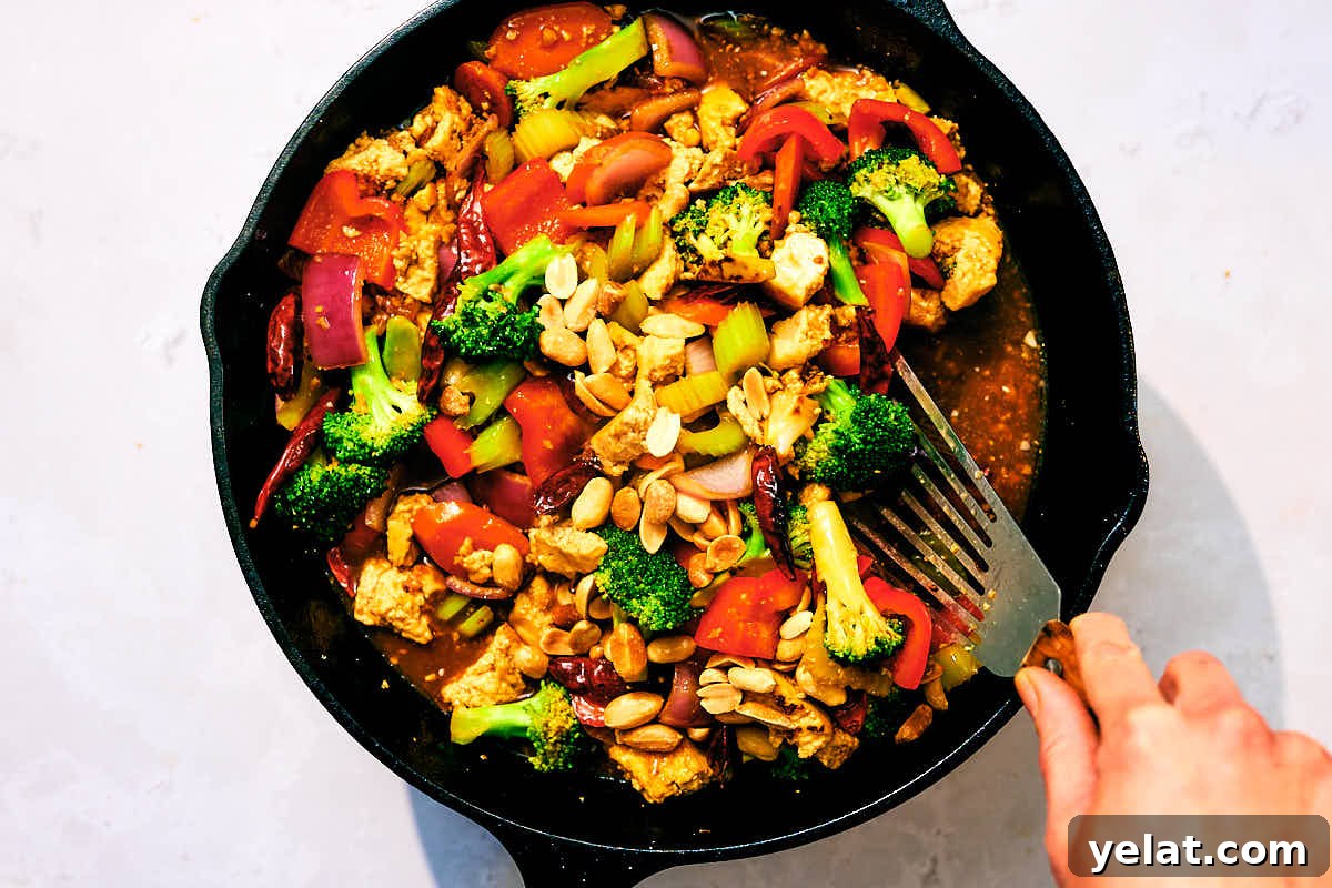 Spicy Kung Pao Tofu with Stir-Fried Vegetables 12 Vegan Kung Pao Vegetables being sauteed in a skillet.