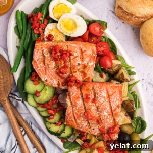 Grilled Salmon on a platter with Nicoise Salad