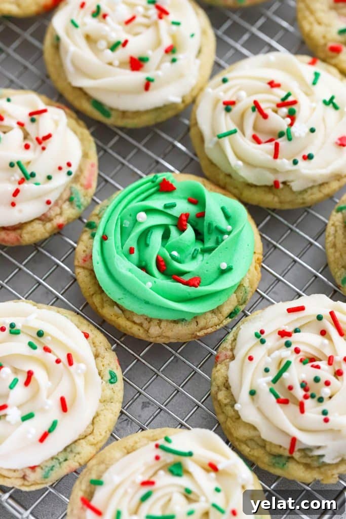 gluten-free christmas sugar cookies with green and white frosting and holiday sprinkles