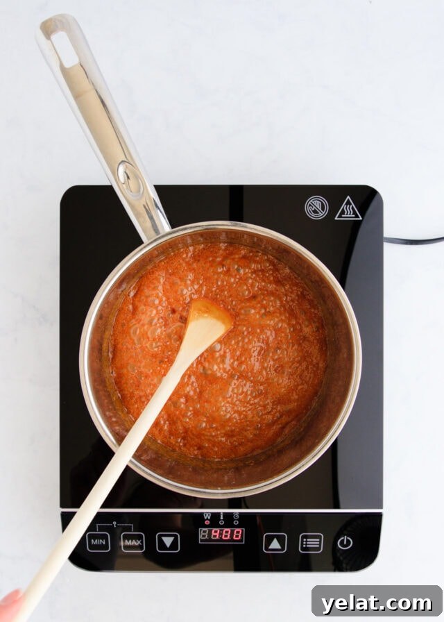 Homemade Rum Caramel Sauce Recipe for Desserts and Drizzling 10 The caramel being cooked a little more.