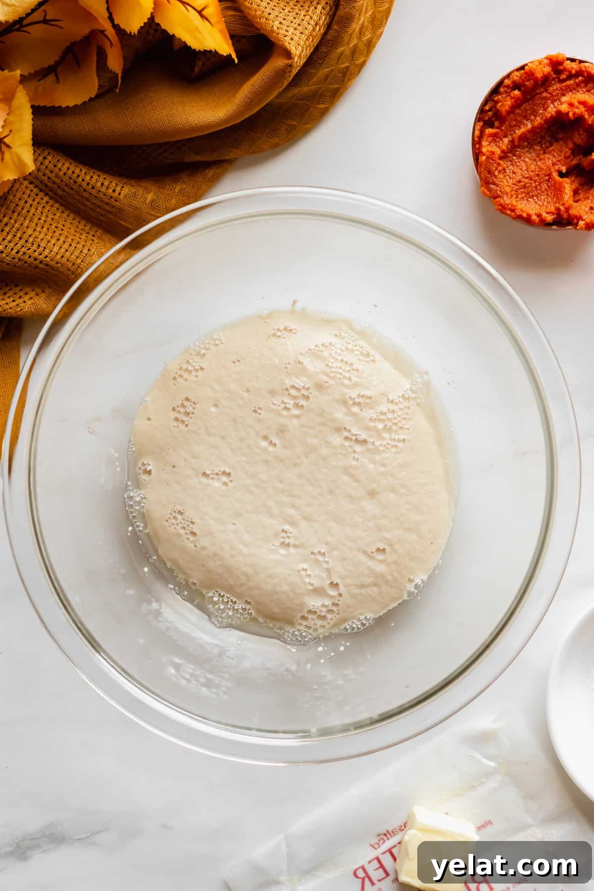 Foamy yeast in a bowl.