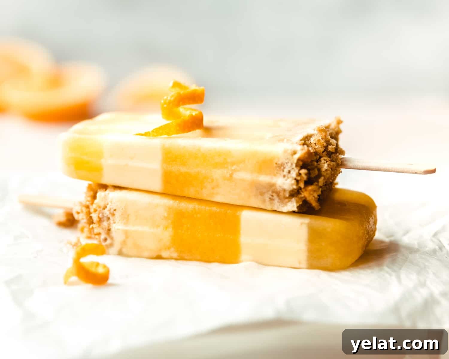 Creamsicle Ice Pops with Graham Cracker Crumble 12 Make a batch of these delicious, creamy orange flavored creamsicles with a layer of crunchy graham cracker crumbles.