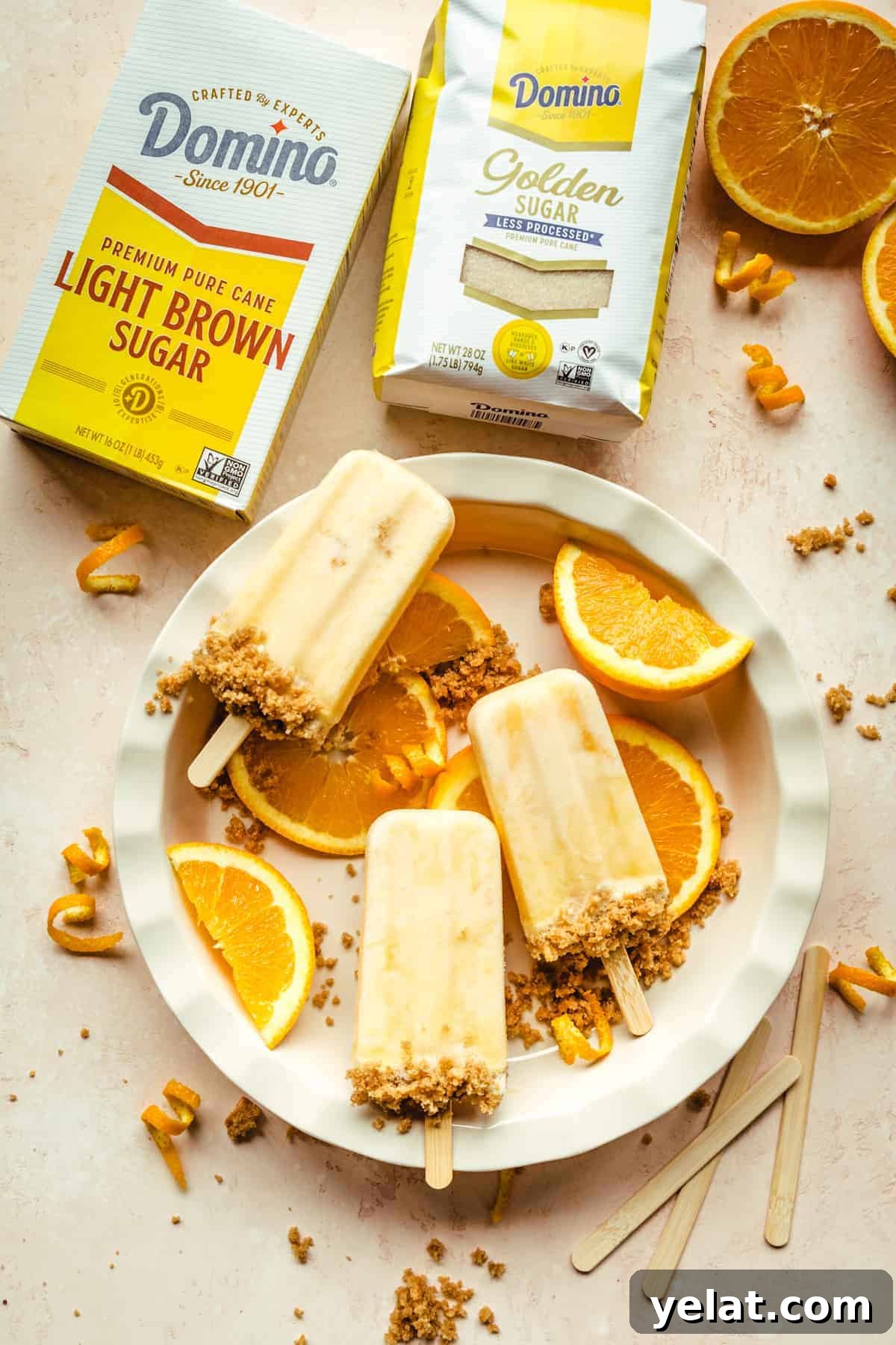 Creamsicle Ice Pops with Graham Cracker Crumble 4 Make your own orange creamsicles with a crunchy graham cracker topping with this easy recipe.