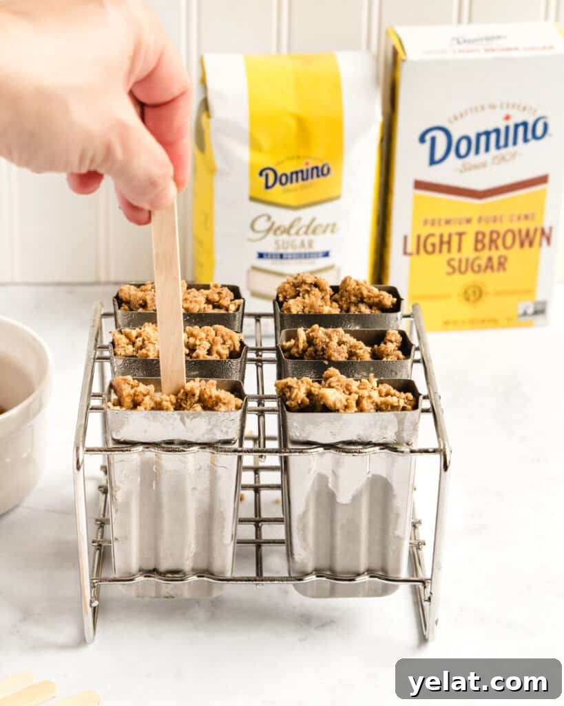 Creamsicle Ice Pops with Graham Cracker Crumble 7 These creamsicles with graham cracker crumble are the perfect refreshing treat to help cool you off.
