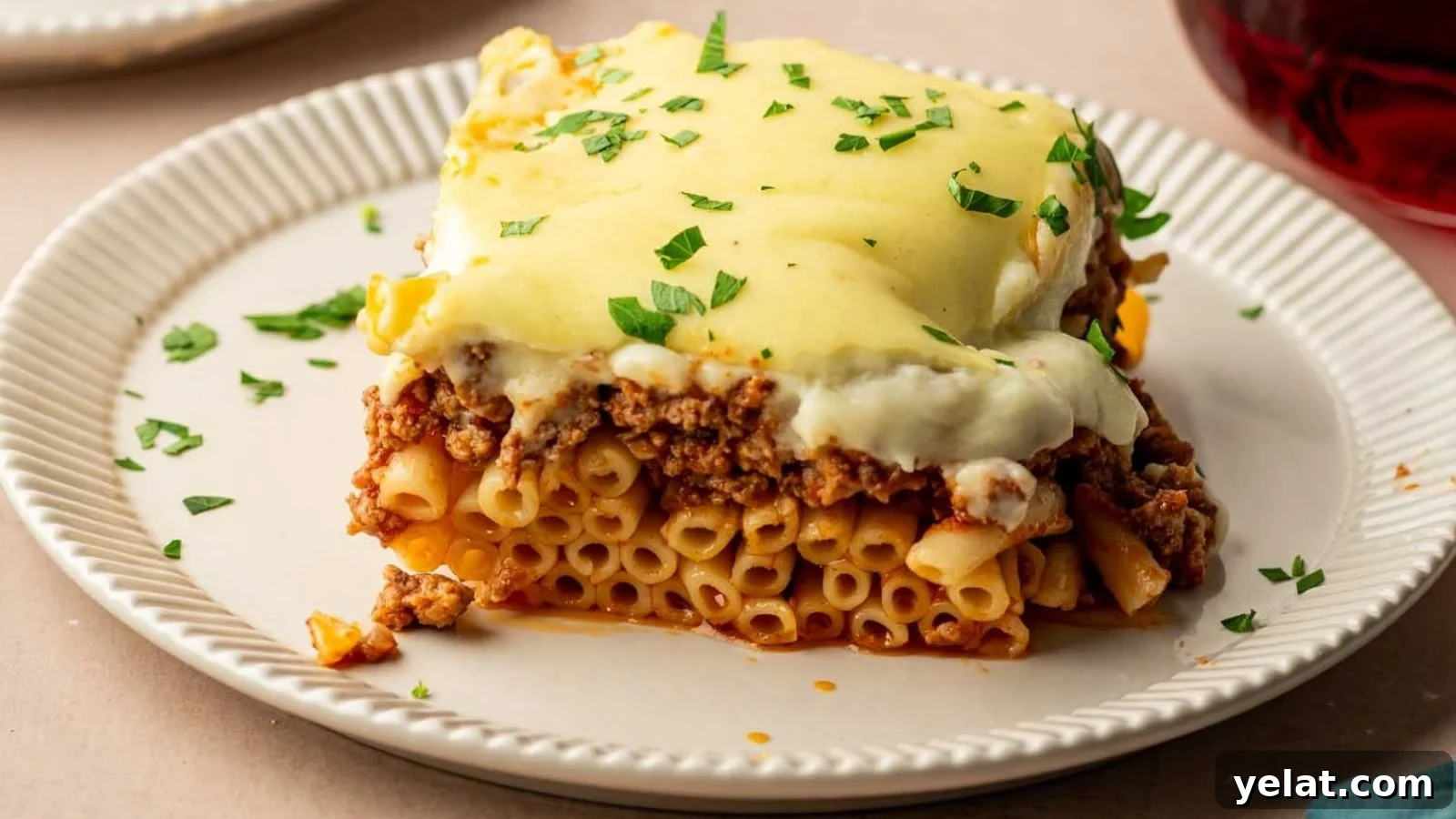 Traditional Pastitsio: Baked Greek pasta layered with meat sauce and béchamel.