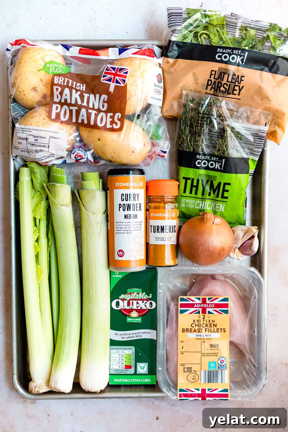 Chicken and leek soup ingredients on a tray.
