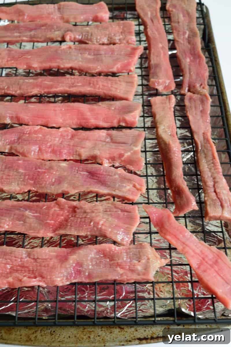 Mai Tai-Marinated Beef Jerky Recipe for Tropical Flavor 5 Mai Tai Beef Jerky on Cooling Rack