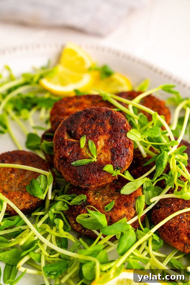 Fried black-eyed pea patties on a serving board