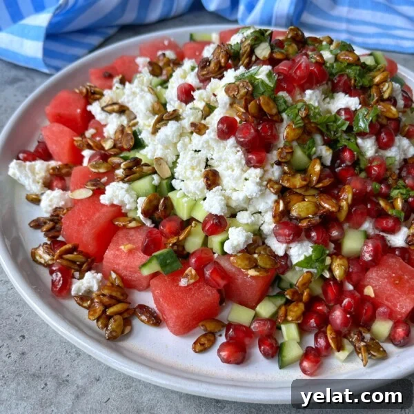 Fresh Watermelon Salsa Recipe for Summer Parties 6 A plate of fresh watermelon, cucumber, and crumbled feta topped with pomegranate seeds, chopped herbs, and caramelized sunflower seeds makes for one of the most refreshing health bites in summer food recipes.
