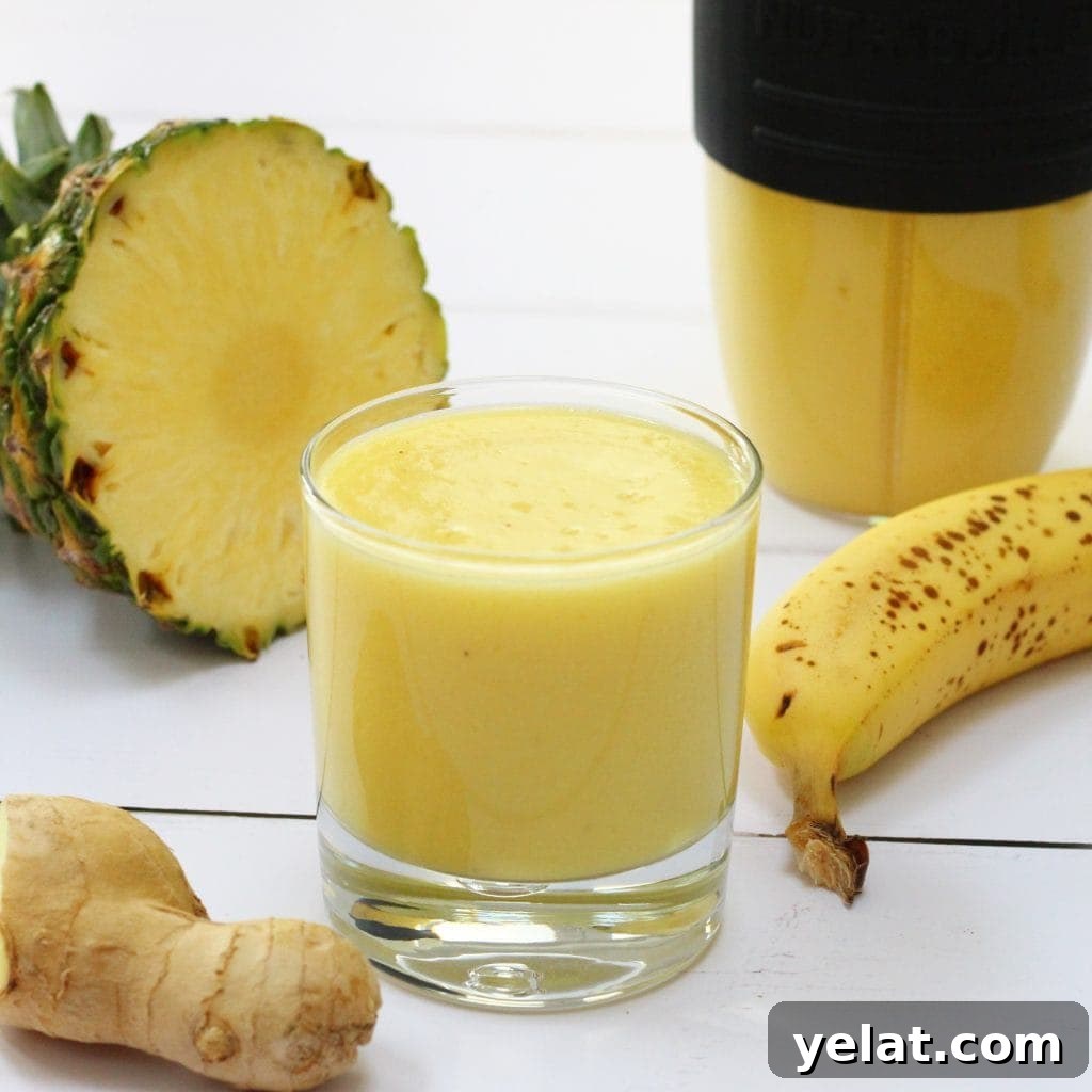 Tropical ginger smoothie made with pineapple, banana, mango and ginger