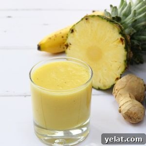 Tropical ginger smoothie made with pineapple, banana, mango and ginger