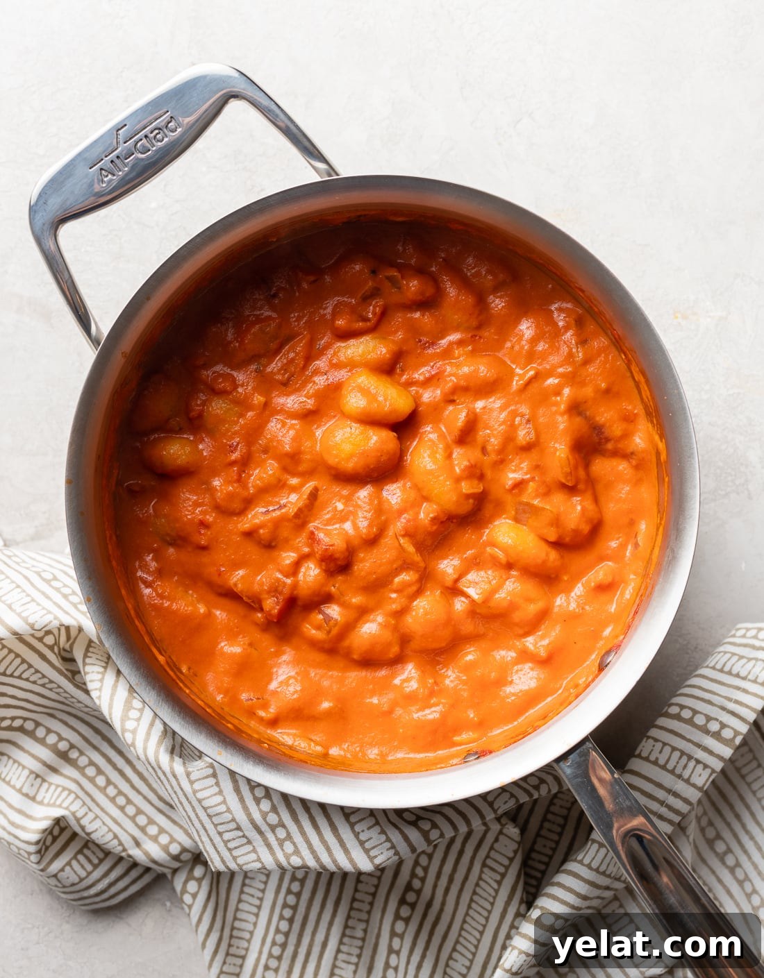 Creamy Gnocchi alla Vodka Recipe for Cozy Weeknight Dinners 3 Gnocchi cooking in a rich vodka sauce.