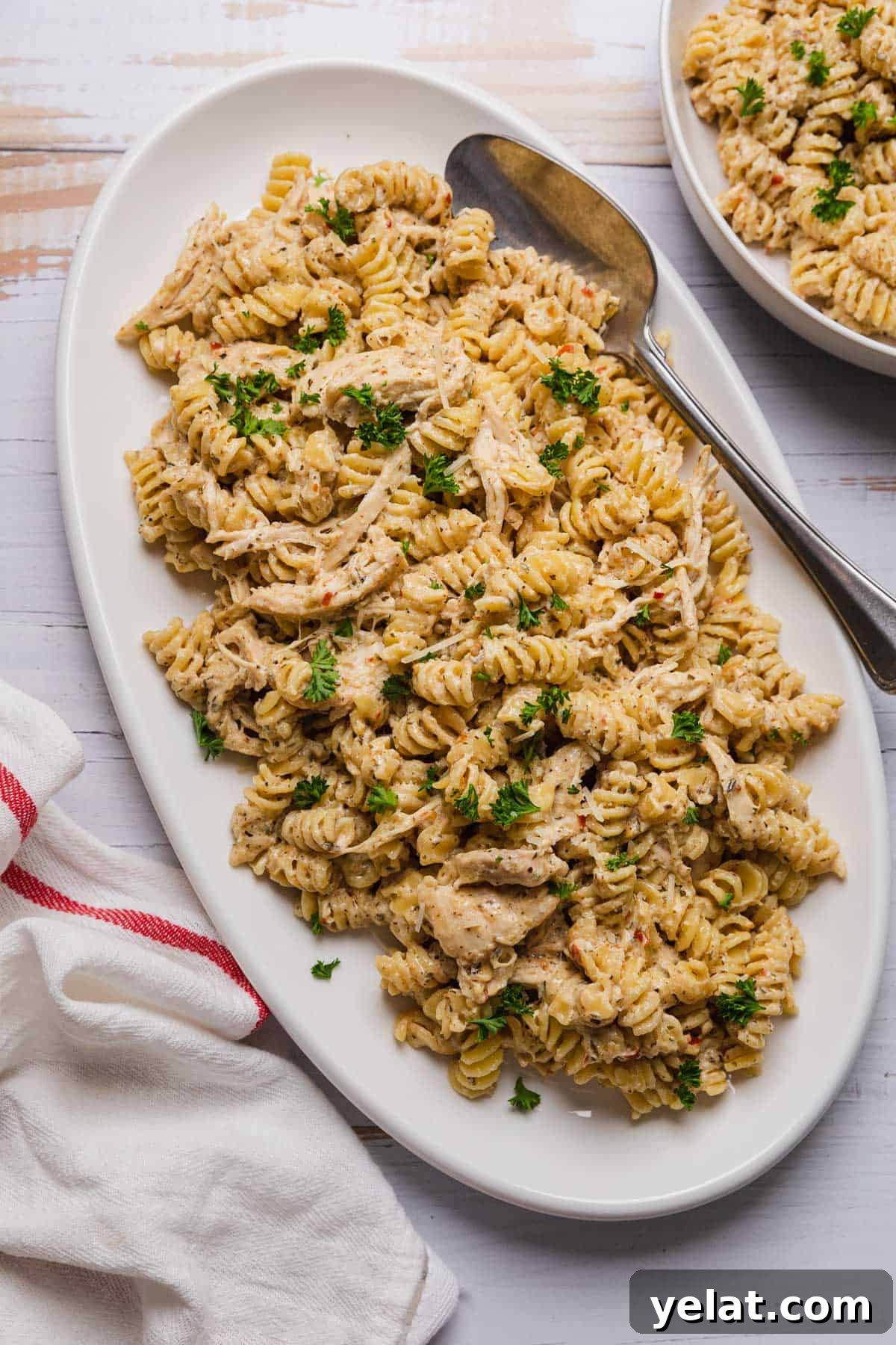 Slow-Cooker Garlic Parmesan Chicken Pasta Recipe 10 a platter of the finished recipe