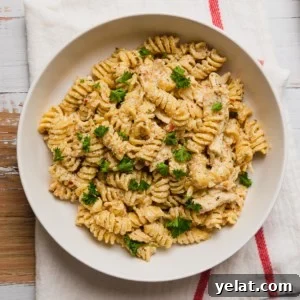 Slow-Cooker Garlic Parmesan Chicken Pasta Recipe 11 a bowl of garlic parmesan chicken pasta