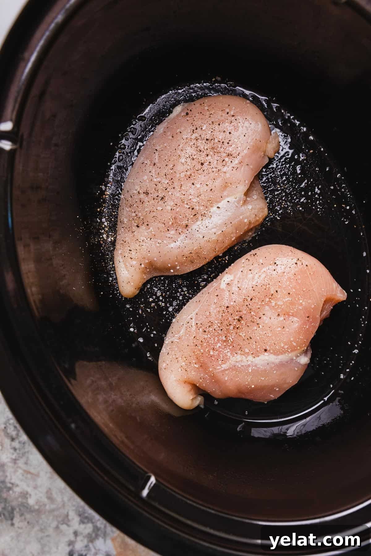 Slow-Cooker Garlic Parmesan Chicken Pasta Recipe 4 uncooked chicken breasts in a crockpot