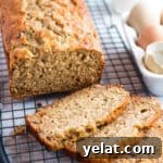 25 Sourdough Breakfast Ideas: 25+ Recipes for Morning Bread Dishes 10 Loaf of sourdough banana bread on a cooling rack