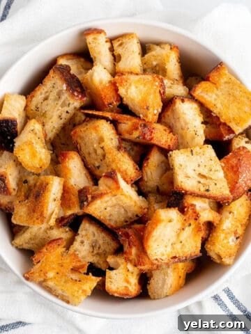A bowl full of homemade croutons.