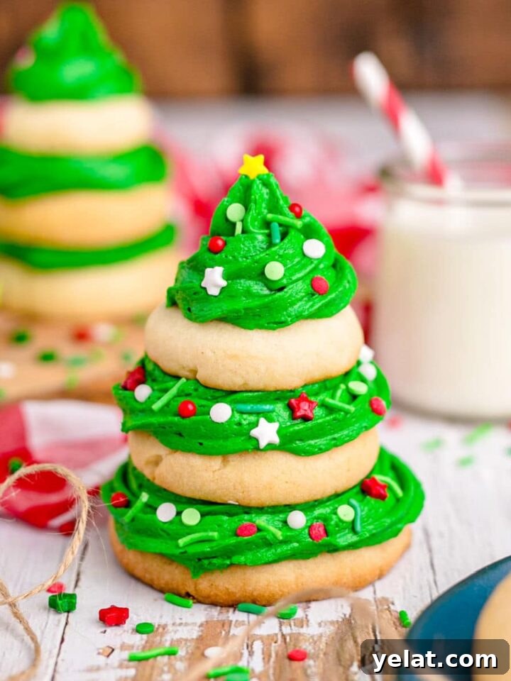 Festive Christmas Oreo Cookie Recipes for Holiday Baking 6 image of a stack of sugar cookies with green frosting that makes it look like a christmas tree