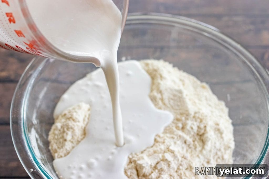 Moist Dairy-Free Blueberry Muffins Recipe 6 coconut milk being added