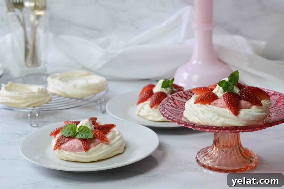 Light and Creamy Strawberry Mousse Pavlovas Recipe 7 3 dishes filled with strawberry mousse pavlovas.