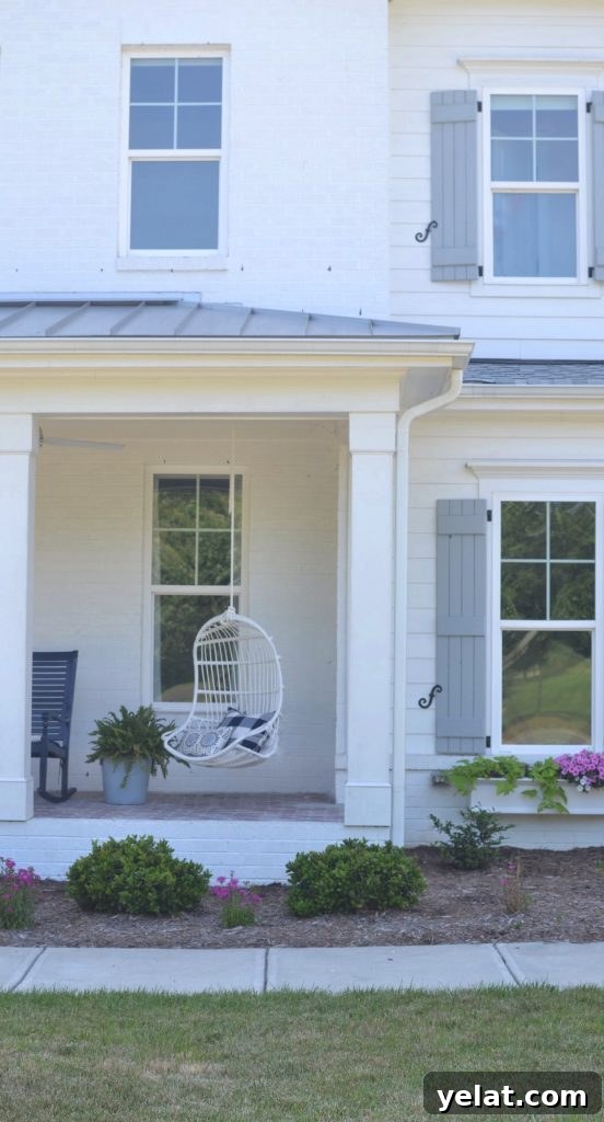 Serena and Lily Home Styling: How I Styled Their Pieces in My Space 20 white hanging outdoor chair on a porch
