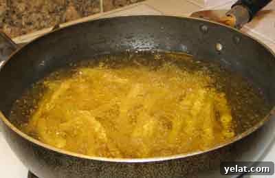 Serve Leftover Meat Greek-Style: Flavorful Mediterranean Recipes 2 Frying potatoes to serve with leftovers.