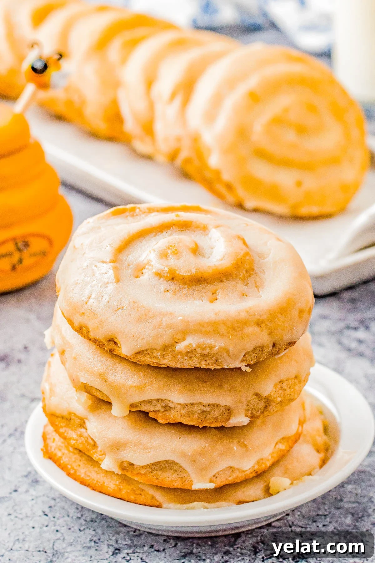 Soft-Baked Honey Bun Cookies Recipe for Irresistible Flavor 2 Honey Bun Cookies (Crumbl Cookies Copycat) - Soft and chewy with a warm buttery cinnamon flavor, these cookies resemble a classic Honey Bun with their fun swirl on top! The sweet honey glaze makes them IRRESISTIBLE!