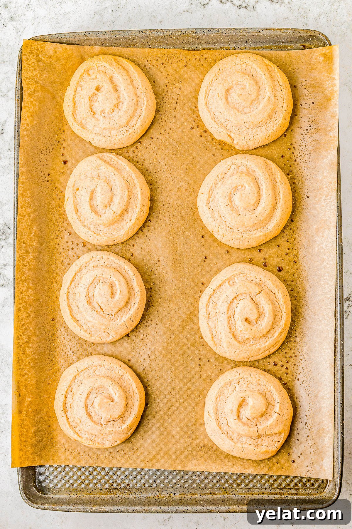 Soft-Baked Honey Bun Cookies Recipe for Irresistible Flavor 15 Brushing honey butter glaze onto cookies