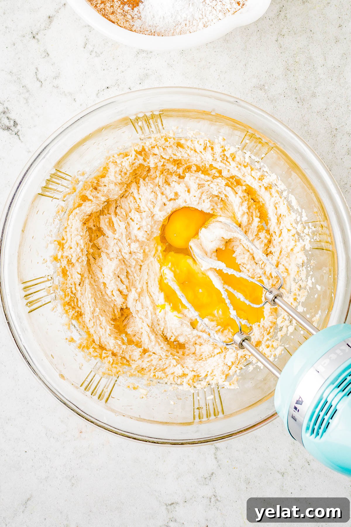 Soft-Baked Honey Bun Cookies Recipe for Irresistible Flavor 8 Adding eggs to cookie dough